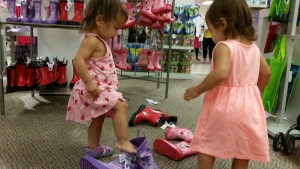 Jenna and Julia trying out shoes
